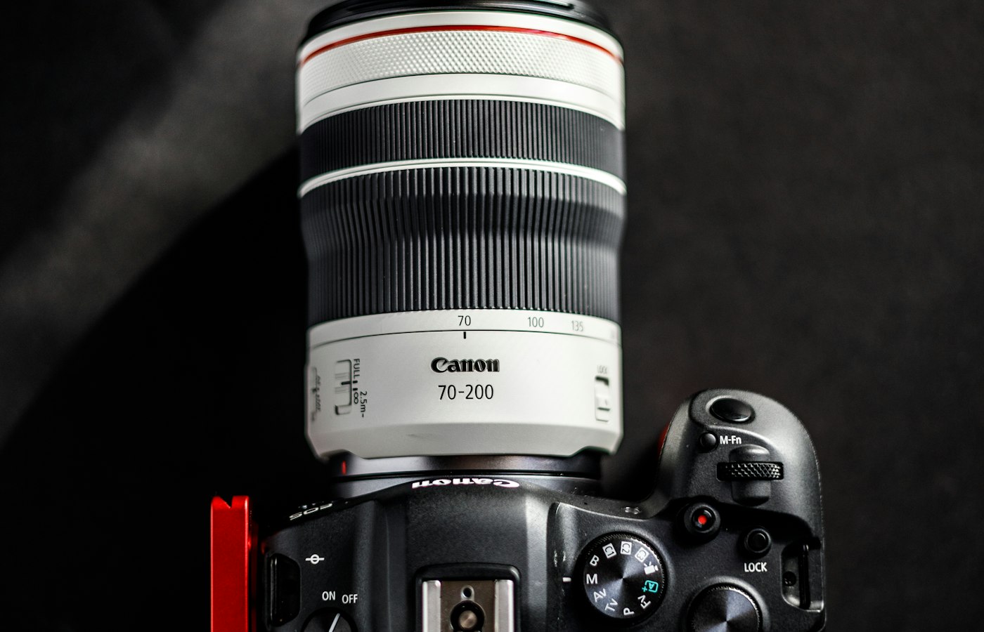 Mirrorless camera with a telephoto lens, used for corporate and product photography
